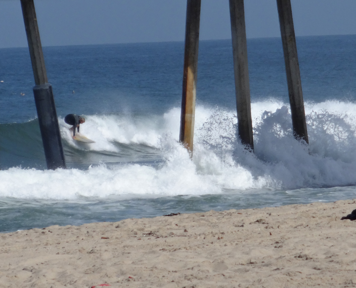 surfing-through-the-pier