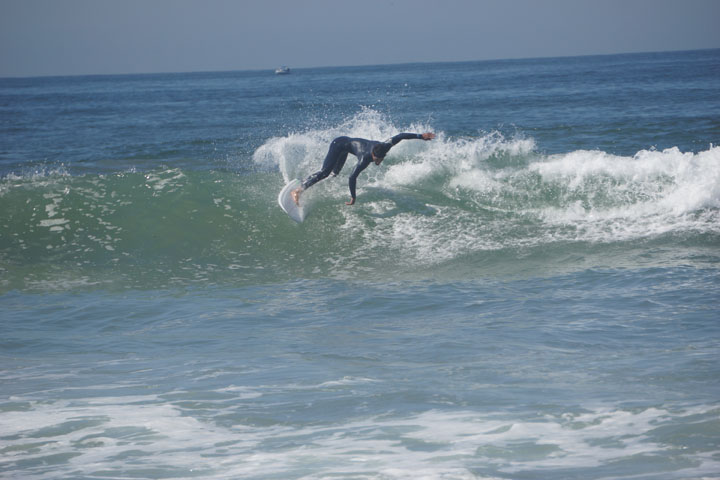 surfer-twisting-away-hermosa