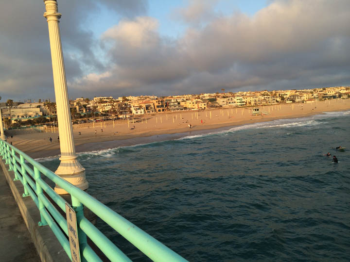mb-clouds-sunset-pier-surfers