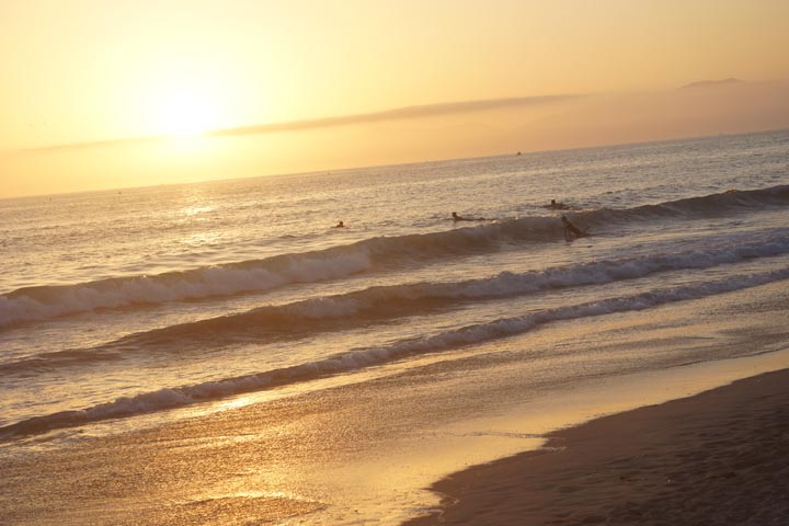 El Porto sunset with surfers
