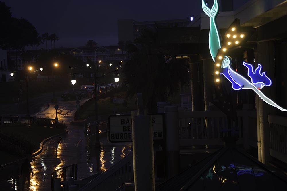 neon-mermaid-rainy-night-redondo-pier