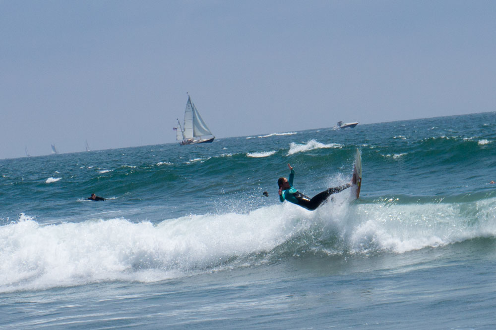 surfer-levitating-venice-boats