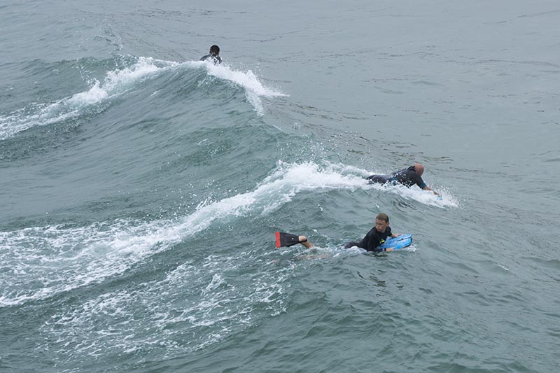 young-body-boarder-looking-back