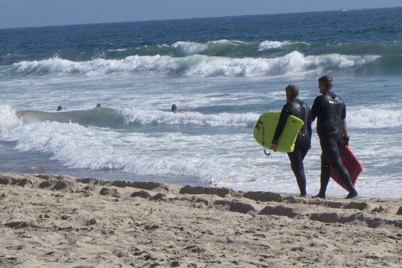 body-boarders-el-porto-walking-sand