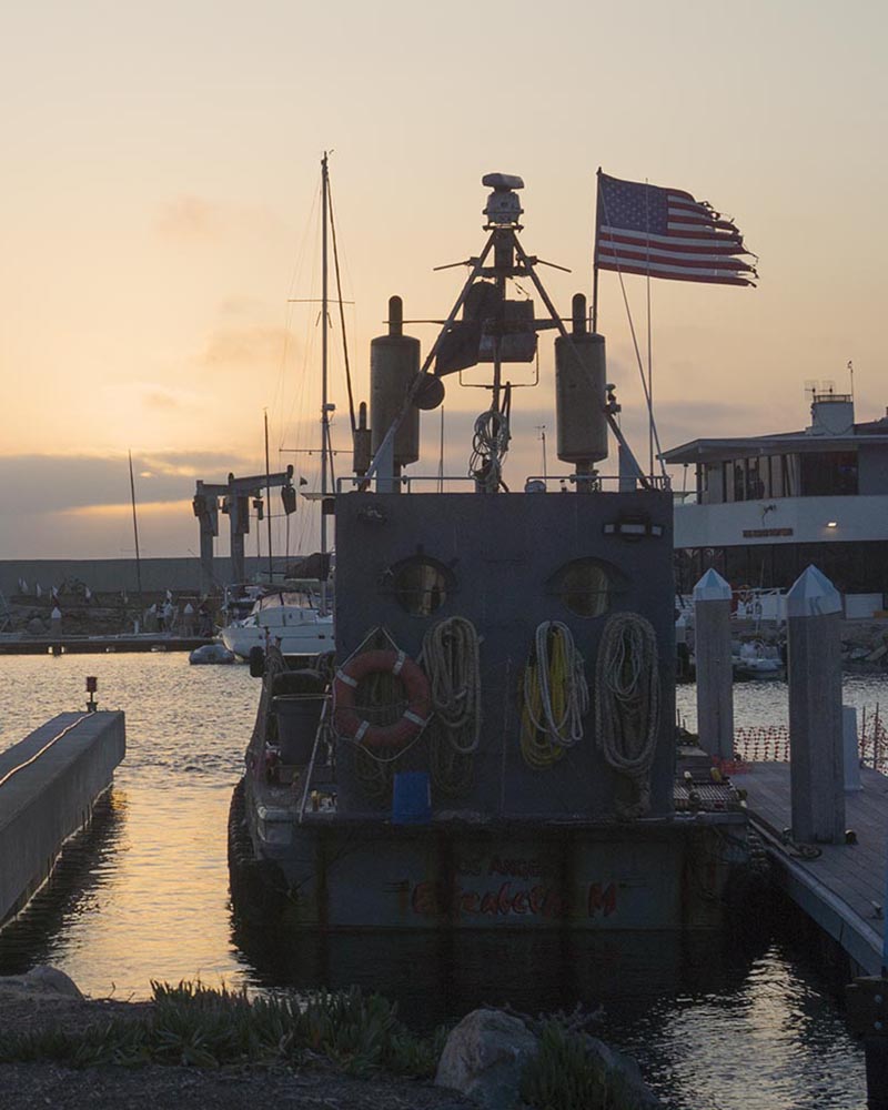 tattered-nautical-flag-sunset-king-harbor