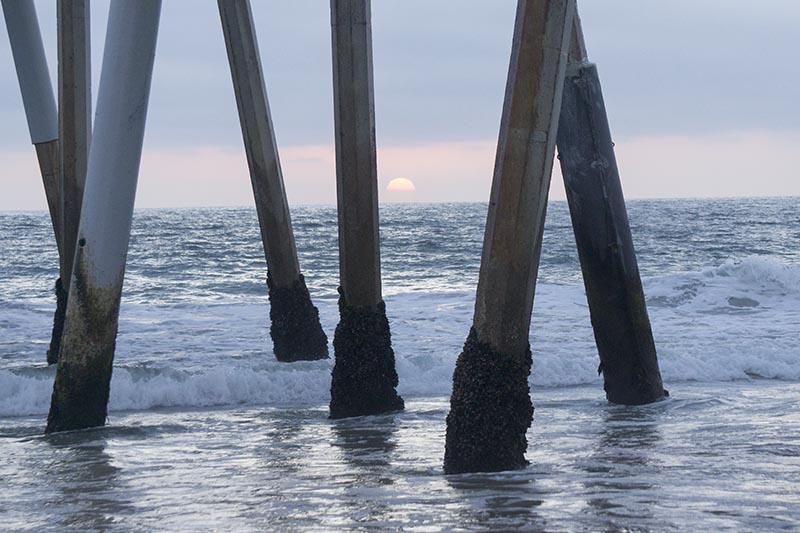 sun-setting-pier-pilings-hermosa-aug