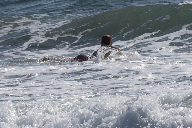 paddling-out-first-day-fall-hermosa-beach-surfer