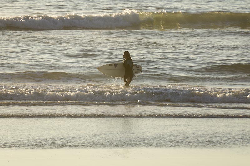 el-porto-surfer-looking-horizon-nov-sat-sunny