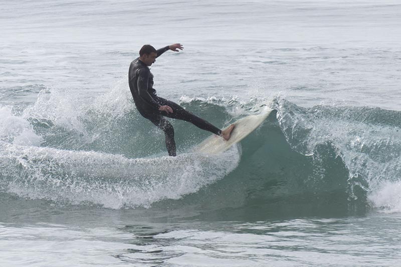 el-porto-surfer-turning-jan-sun-cloudy