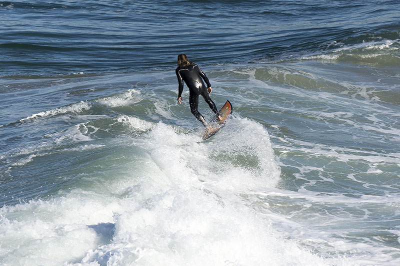 surfer-levitating-mb-pier-march-morning