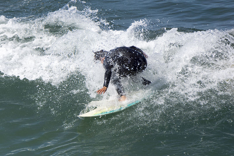keeping-head-down-hermosa-surfer-april