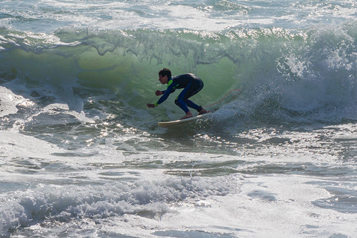 young-surfer-under-wave-mb-pier-may-afternoon