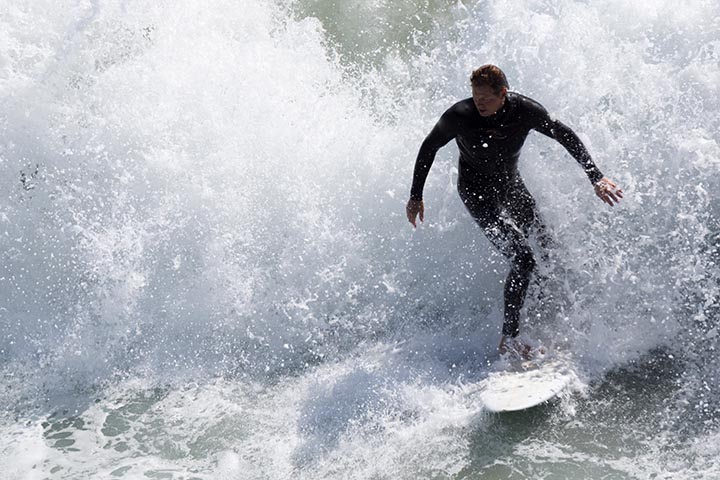 huntington-surfer-south-pier-spray-burst-sept