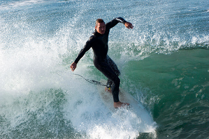 surfer-by-mb-pier-late-nov