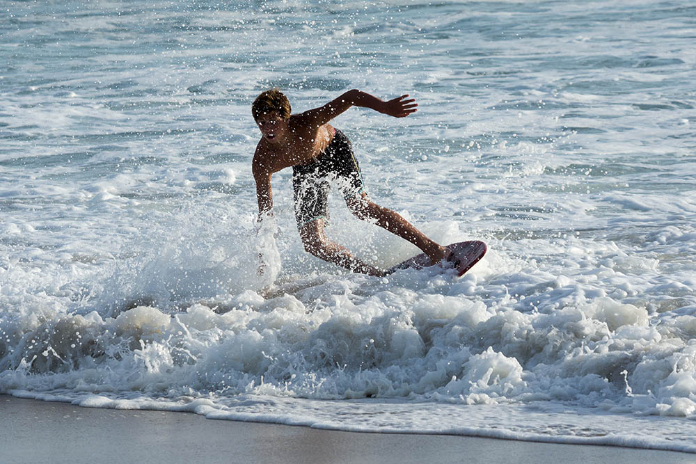 mb-skim-splash-april-evening-near-pier